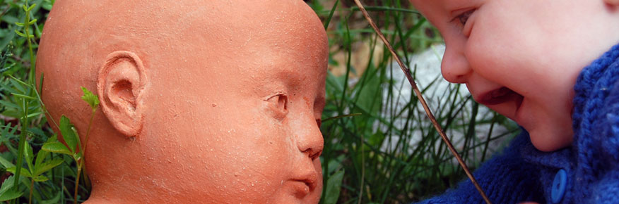 Baby James Looks at His Sculpted Alter Ego